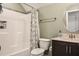 Neutral bathroom featuring a tub, shower, and vanity with sink at 77 Redpine Ct, Clayton, NC 27520