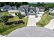 Beautiful two-story home featuring a well-manicured lawn and a two-car garage at 77 Redpine Ct, Clayton, NC 27520