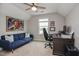 Functional home office featuring a desk, comfortable seating, and natural light at 77 Redpine Ct, Clayton, NC 27520