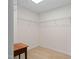 Walk-in closet with wire shelving and carpeted floors at 817 Stable Fern Dr, Fuquay Varina, NC 27526