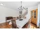 Spacious dining room featuring hardwood floors, and ample space for hosting Gathering gatherings at 817 Stable Fern Dr, Fuquay Varina, NC 27526