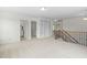 Second floor hallway featuring built-in shelving and access to multiple rooms at 817 Stable Fern Dr, Fuquay Varina, NC 27526