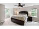 Comfortable main bedroom with ceiling fan and natural light at 8201 Ivymount Way, Raleigh, NC 27613