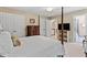 Bedroom with multiple closets and hallway views featuring a four poster bed at 8508 Zinfandel Pl, Raleigh, NC 27615