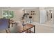 Bonus room with a work area, an accent chair, and bright natural lighting at 8508 Zinfandel Pl, Raleigh, NC 27615