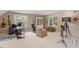 Spacious bonus room featuring a work area, a comfortable seating area, and natural light at 8508 Zinfandel Pl, Raleigh, NC 27615