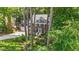 Beautiful brick home with a well-manicured front yard and mature trees providing shade and privacy at 8508 Zinfandel Pl, Raleigh, NC 27615