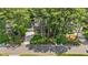 Traditional brick home with a well-maintained yard and driveway, surrounded by mature trees at 8508 Zinfandel Pl, Raleigh, NC 27615