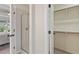Bathroom area features a standalone shower with glass door, with a view into a walk in closet at 8912 Erinsbrook Dr, Raleigh, NC 27617
