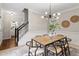 Dining area with modern light fixture and stylish decor for comfortable Gathering meals at 8912 Erinsbrook Dr, Raleigh, NC 27617