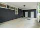 Spacious carport featuring concrete flooring, storage closets, and ample parking at 914 Forest Dr, Garner, NC 27529