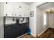 Charming coffee bar features custom cabinetry, providing a dedicated space for coffee preparation and storage at 914 Forest Dr, Garner, NC 27529