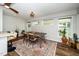 Comfortable dining area with a rustic table, stylish chairs, and ample natural light for enjoyable meals at 914 Forest Dr, Garner, NC 27529