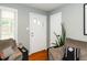 Inviting living room with neutral tones and a bright front entrance at 914 Forest Dr, Garner, NC 27529