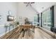 Bright home office with vaulted ceiling, wood floors, and a large window with natural light at 9530 Vira Dr, Raleigh, NC 27617