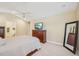 Comfortable primary bedroom showcasing a TV and neutral decor at 9530 Vira Dr, Raleigh, NC 27617