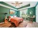 Stylish primary bedroom featuring hardwood floors, tray ceilings, and generous natural light at 1004 Lake Michael Way, Mebane, NC 27302