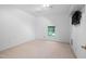 Neutral bedroom with carpet, a window, and a ceiling mounted air conditioner at 101 Deerwalk Ct, Cary, NC 27513