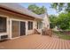 An outdoor wood deck with metal railing and awning offers space for outdoor living at 101 Deerwalk Ct, Cary, NC 27513