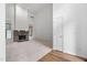 Inviting living room with stone fireplace, carpeted floor, and windows providing lots of natural light at 101 Deerwalk Ct, Cary, NC 27513
