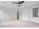 Spacious, carpeted primary bedroom with neutral walls and natural light at 101 Deerwalk Ct, Cary, NC 27513