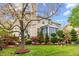 Spacious backyard with patio and lush landscaping offering a peaceful outdoor oasis at 1012 Delta River Way, Knightdale, NC 27545
