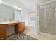 Bathroom featuring double sinks, soaking tub and walk-in shower for a luxurious feel at 1012 Delta River Way, Knightdale, NC 27545