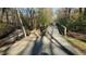 Scenic walking trail through a serene wooded area with bridge at 1012 Delta River Way, Knightdale, NC 27545