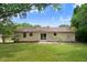 Expansive backyard with a sliding glass door and lush lawn, great for outdoor enjoyment at 103 Val Del Ct, Garner, NC 27529