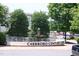 Carrboro Century Center building behind fountain and landscaping, creating a tranquil outdoor setting at 103 Westview # H, Carrboro, NC 27510