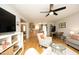 Open-concept living space seamlessly connects the living room, dining area, and kitchen at 103 Westview # H, Carrboro, NC 27510