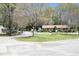 Charming street view showing well-maintained homes and green spaces in a quiet neighborhood at 103 Westview # H, Carrboro, NC 27510