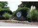 Chapel Hill Tennis Club sign surrounded by lush landscaping and greenery at 103 Westview # H, Carrboro, NC 27510