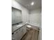 Bathroom featuring a granite countertop vanity and tub/shower combo at 104 Oakfield Trace Dr, Four Oaks, NC 27524