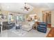 Bright living room with vaulted ceilings, fireplace, and neutral decor at 109 Jasmine Rose Ct, Holly Springs, NC 27540