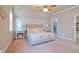 Inviting bedroom with a plush bed, decorative pillows, and matching nightstands at 1161 Golden Star Way, Wake Forest, NC 27587