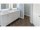 Modern bathroom vanity boasts double sinks, undermount lighting and ample storage at 117 Brierridge Dr, Apex, NC 27502