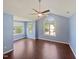 Spacious bedroom with high ceilings and natural light from multiple windows at 117 Brierridge Dr, Apex, NC 27502
