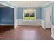 Bright dining room featuring elegant chandelier and natural light at 117 Brierridge Dr, Apex, NC 27502
