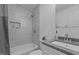 Bright bathroom features a combination shower and tub with subway tiles at 1204 Pecan Pl, Durham, NC 27704