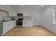 Bright eat-in kitchen with stainless steel appliances and recessed lighting at 1204 Pecan Pl, Durham, NC 27704