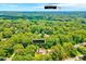 Drone image of neighborhood of 1209 Lochcarron Ln with downtown Raleigh 13.3 miles away at 1209 Locharron Ln, Cary, NC 27511