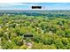Drone image of neighborhood of 1209 Lochcarron Ln with downtown Cary 2.8 miles away at 1209 Locharron Ln, Cary, NC 27511