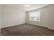 Bedroom featuring a light fixture and one window letting in natural light at 125 Durban Meadow Dr, Holly Springs, NC 27540
