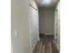 The hallway shows new floors, paint, and access to other areas of the home at 125 Tast Dr, Wendell, NC 27591