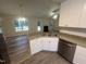 A kitchen island offers additional counter space, stainless steel appliances, and open floorplan at 125 Tast Dr, Wendell, NC 27591