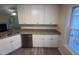 A view of the kitchen with stainless steel appliances and an open concept to the living room at 125 Tast Dr, Wendell, NC 27591