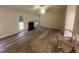 The living room features new floors, a fireplace, and access to the deck at 125 Tast Dr, Wendell, NC 27591