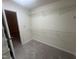 Walk-in closet with wire shelving and neutral carpet, accessible through an interior door at 125 Tast Dr, Wendell, NC 27591