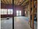 Unfinished basement offering ample space and natural light with a walkout to the yard at 129 Grande Dr, Morrisville, NC 27560